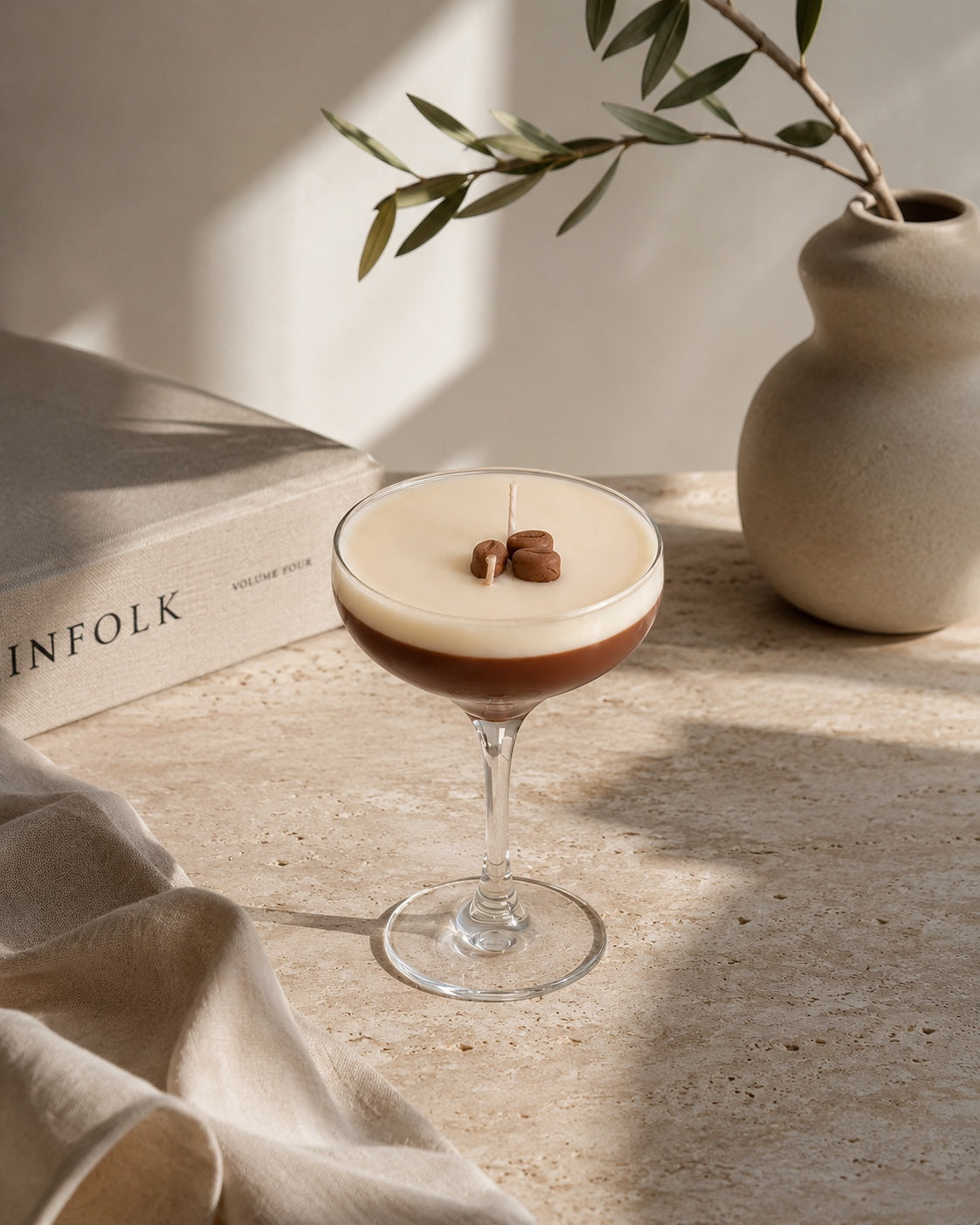 I'MI.STORE espresso martini cocktail glass candle with dual-layered wax and realistic coffee bean toppings.